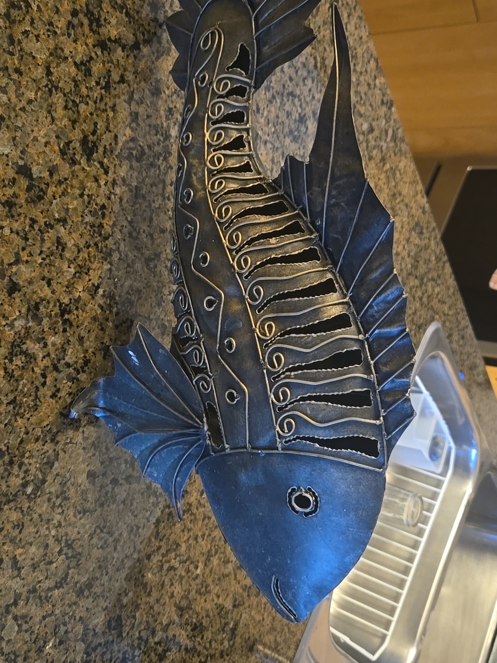 Accent decor metal fish with lots of details. Ideal for inside or outside decor